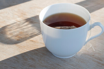 cup of tea on wooden table