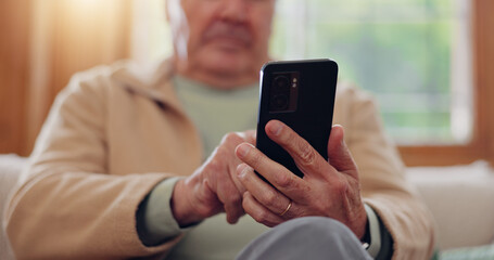 Parkinsons, smartphone and hands of senior man typing online on internet search in retirement home. Phone, elderly person with a disability and scroll on health website, communication or social media