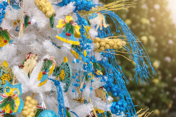New Year tree decorated in yellow and blue colors of Ukraine.