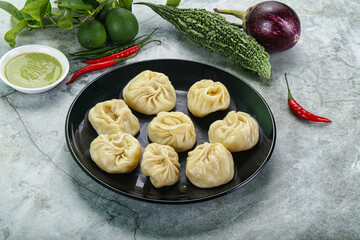 Nepali steamed dumplings  Momo with sause