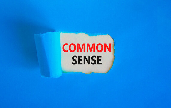 Common sense symbol. Concept words Common sense on beautiful white paper. Beautiful blue table blue background. Business, motivational common sense concept. Copy space.