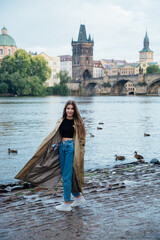 Young female tourist enjoying great view on the old town of Prague.
- 661592928