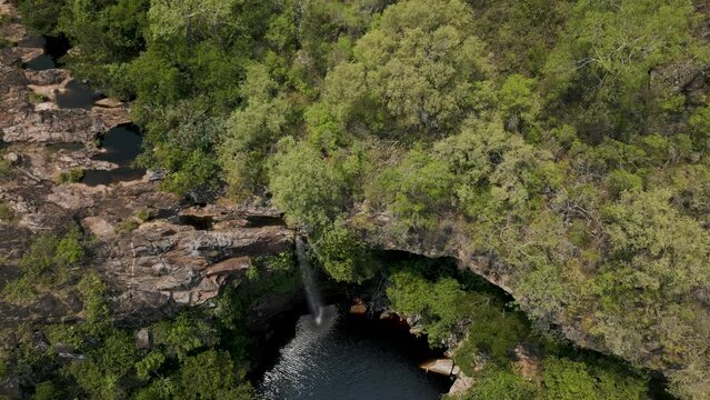 Drone footage of the scenic waterfall Chorro San Luis embedded in a thick, tropical forest near Robor&eacute; in the lowlands of Bolivia - Traveling and exploring South America - natural look