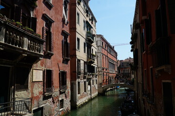 Salt damage to old bricks and marble in Venice, due to repeated flooding with salt water from the Adriatic coast of the Mediterranean Sea. Full image with erosion damage. Venice, Italy, Europe.