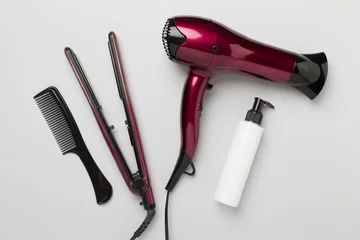 Zelfklevend Fotobehang Hair tools with thermo protection on color background, top, view © Liami