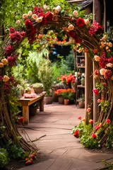 Fotobehang Whimsigothic garden arch with red and white roses flowers, vertical © Sunshower Shots