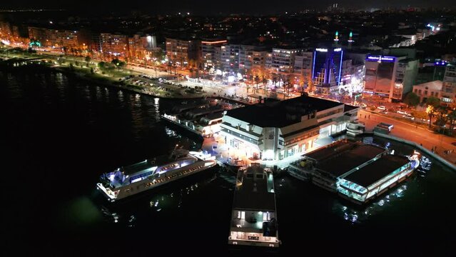 izmir karsiyaka district, sea and ferries and traffic n aerial view with drone on a sunny day. High quality 4k footage