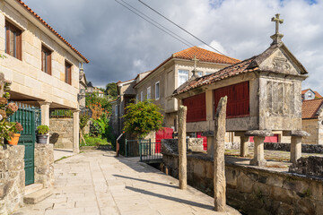 Fototapeta na wymiar Typical horreos in the beautiful fishing village of Combarro, in Pontevedra, Galicia