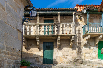 Fototapeta na wymiar Old houses with balconies in the fishing village of Combarro, in Pontevedra, Galicia