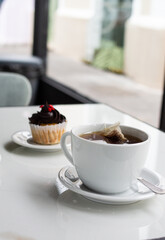 Taza de té con muffiin