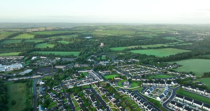 Overhead birds eye view Blarney castle and Blarney castle house Cork Ireland 4k