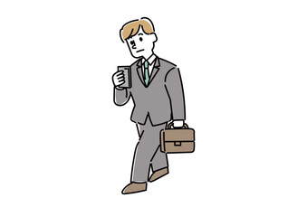歩きながらスマートフォンを操作しているビジネスマンの男性