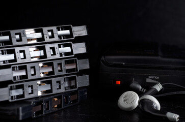 Old Cassette Tapes with Headphones and Cassette Player