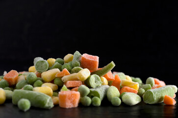 Macro Image of Frozen Vegetables with Black Background