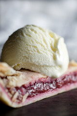 Macro Image of Raspberry Pie with Melting Vanilla Ice Cream