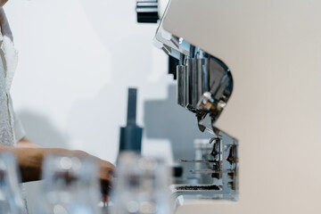 Barista making coffee in cafe