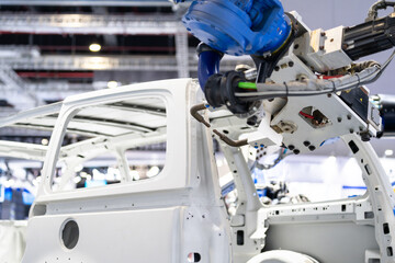 robot arm working in car factory