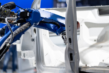 robot arm working in car factory