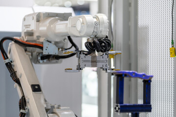 robot arm working in car factory