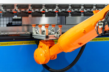 robot arm working in car factory