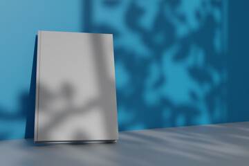 white blank book for mocup design with branch shadows and white floor, brown walls. 3d rendering