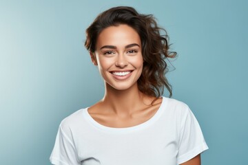 Fototapeta premium Portrait of a Happy Fictional Cute Brunette Model Smiling Candidly. Isolated on a Plain Colored Background. Generative AI. 