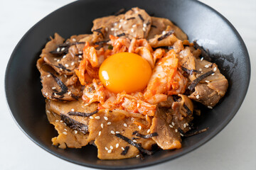 pork bulgogi rice bowl with kimchi and Korean pickled egg