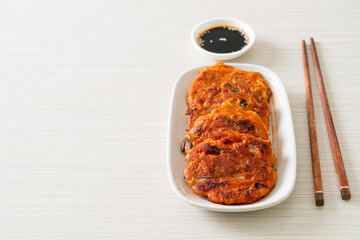 Korean Kimchi pancake or Kimchijeon - Fried Mixed Egg, Kimchi, and Flour