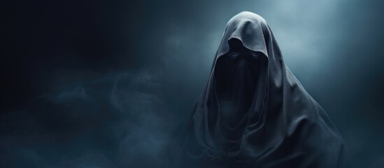 Spectral form with hooded robe With copyspace for text