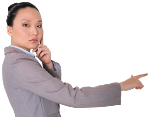 Digital png photo of asian businesswoman pointing on transparent background