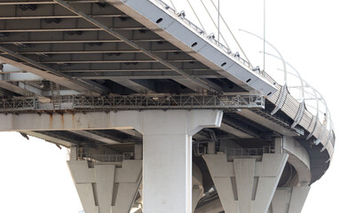 Fototapeta premium Concrete pillars of a large bridge. Bottom view
