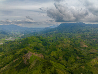 Tropical landscape of mountain valley and green hills. Mindanao, Philippines.