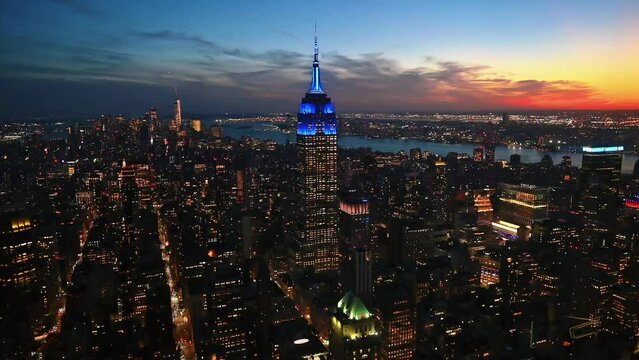 Aerial view of  empire state building and hudson river in manhattan, new york at sunset