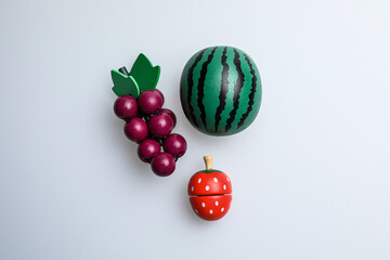 Fresh fruit, vegetables, delicious food, Hamburger and pizza. Colorful educational toys from cute kids.