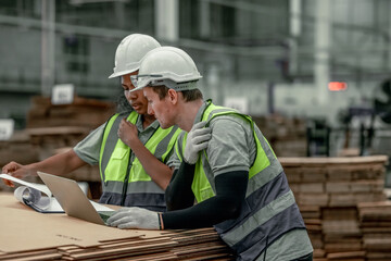 Ethical specialist cuts CO2 in cardboard factory via recycling and renewables, curbing emissions.