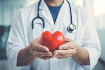 Cardiologist doctor holding a red heart