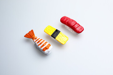 Fresh fruit, vegetables, delicious food, Sushi, 
Hamburger and pizza. Colorful educational toys from cute kids.