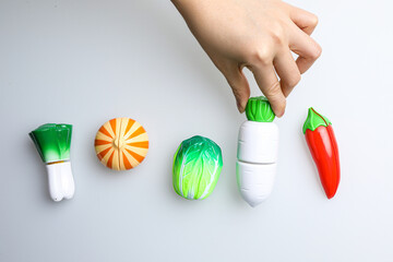Fresh fruit, vegetables, delicious food, Sushi, 
Hamburger and pizza. Colorful educational toys...