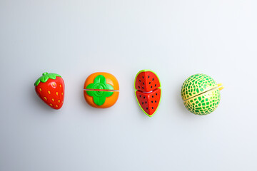 Fresh fruit, vegetables, delicious food, Sushi, 
Hamburger and pizza. Colorful educational toys from cute kids.