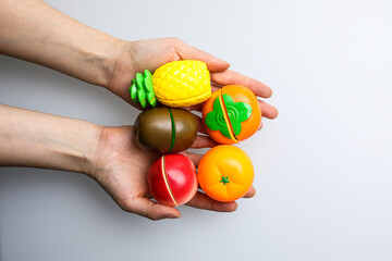 Fresh fruit, vegetables, delicious food, Sushi, 
Hamburger and pizza. Colorful educational toys...