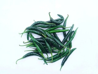 Green curly chilies isolated on a white background. herbs and spices.
 - Powered by Adobe