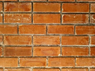 Red brown brick wall  Use as a backdrop.