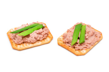 Crispy Salted Cracker with Liver Pate and Green Onions - Isolated on White. Easy Snack - Isolation