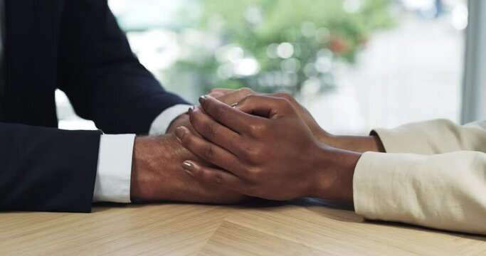 People, man and woman holding hands for care, empathy and gratitude for career, respect or kindness. Business, employee and manager with solidarity and compassion in office at company or corporate