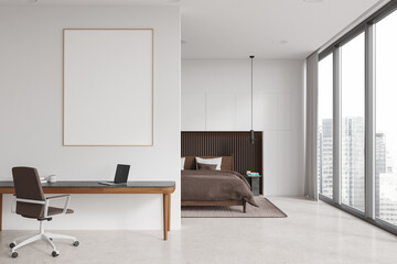 White bedroom interior with workplace and poster