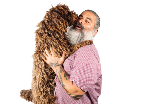 Happy European man hugs cute water dog, posing with pet on transoarent background