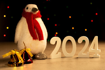 Penguin with red scarf christmas bells 2024