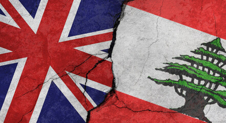 UK and Lebanon flags, cracked concrete wall texture, grunge background, military conflict concept