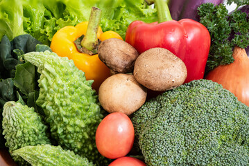 Combine fresh vegetables such as broccoli, lettuce, onion background.