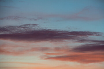 Naklejka na ściany i meble Colorful sunset in the evening sky.